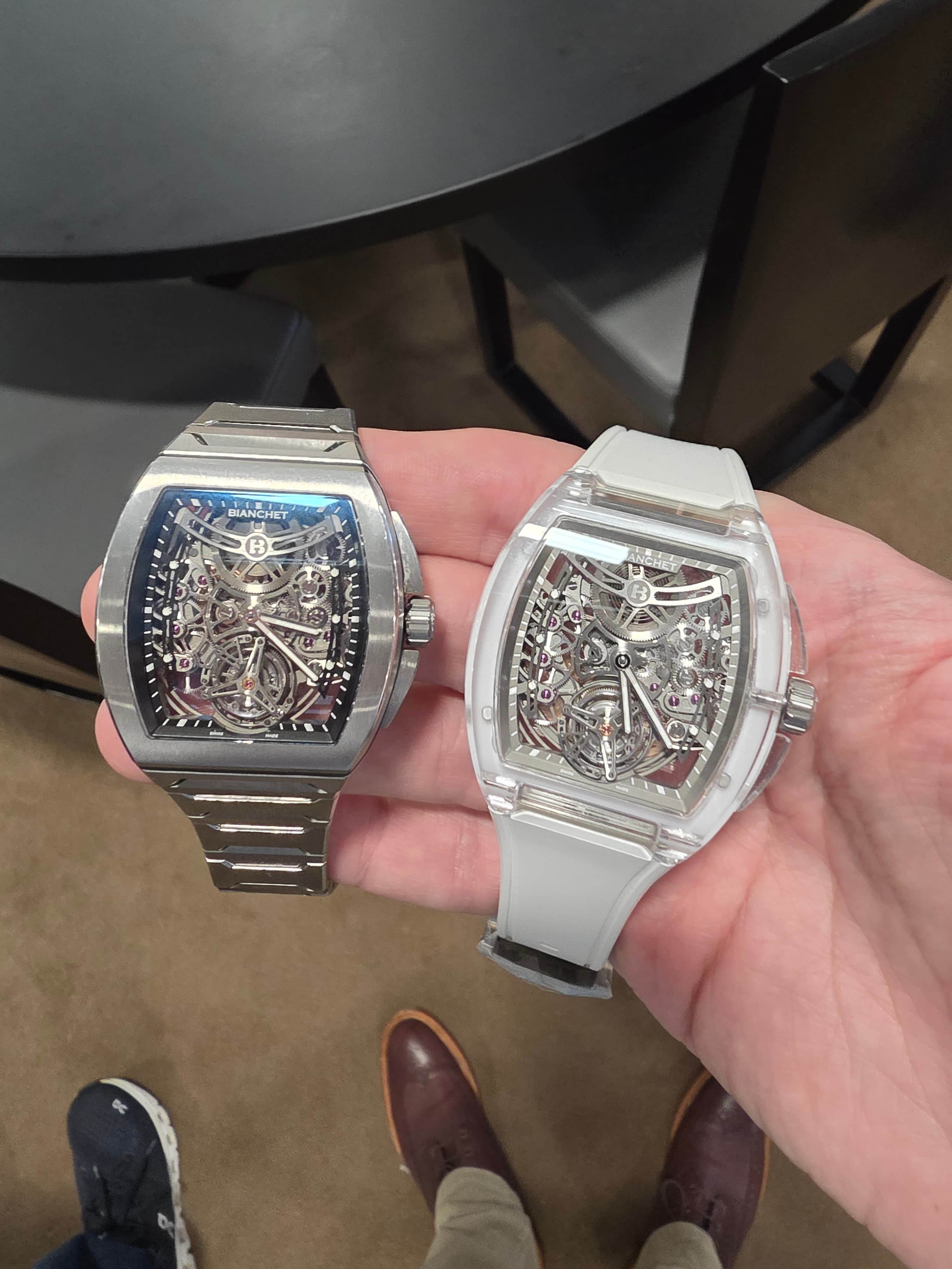 two tourbillon watches by Bianchet, the left handside being in titanium and the right one being in full sapphire case