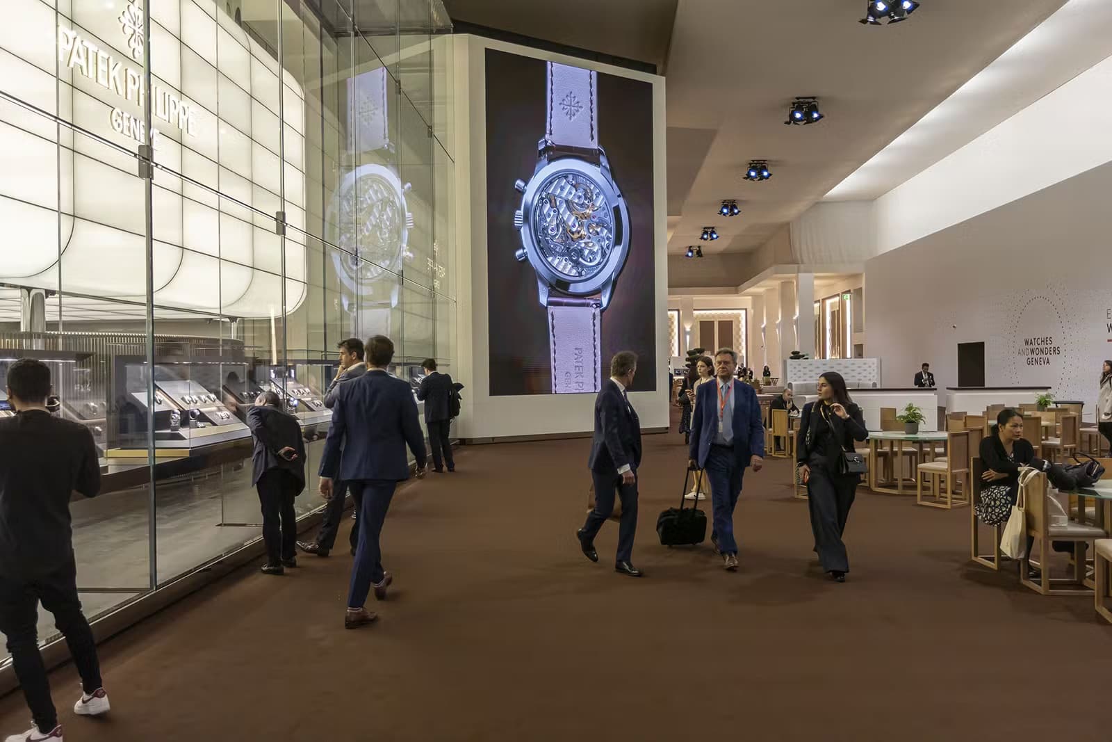 Another image showing how large the Watches and Wonders show is. In this case it shows you can look at the watches of Patek Philippe through the glass on the left hand side of the picture.