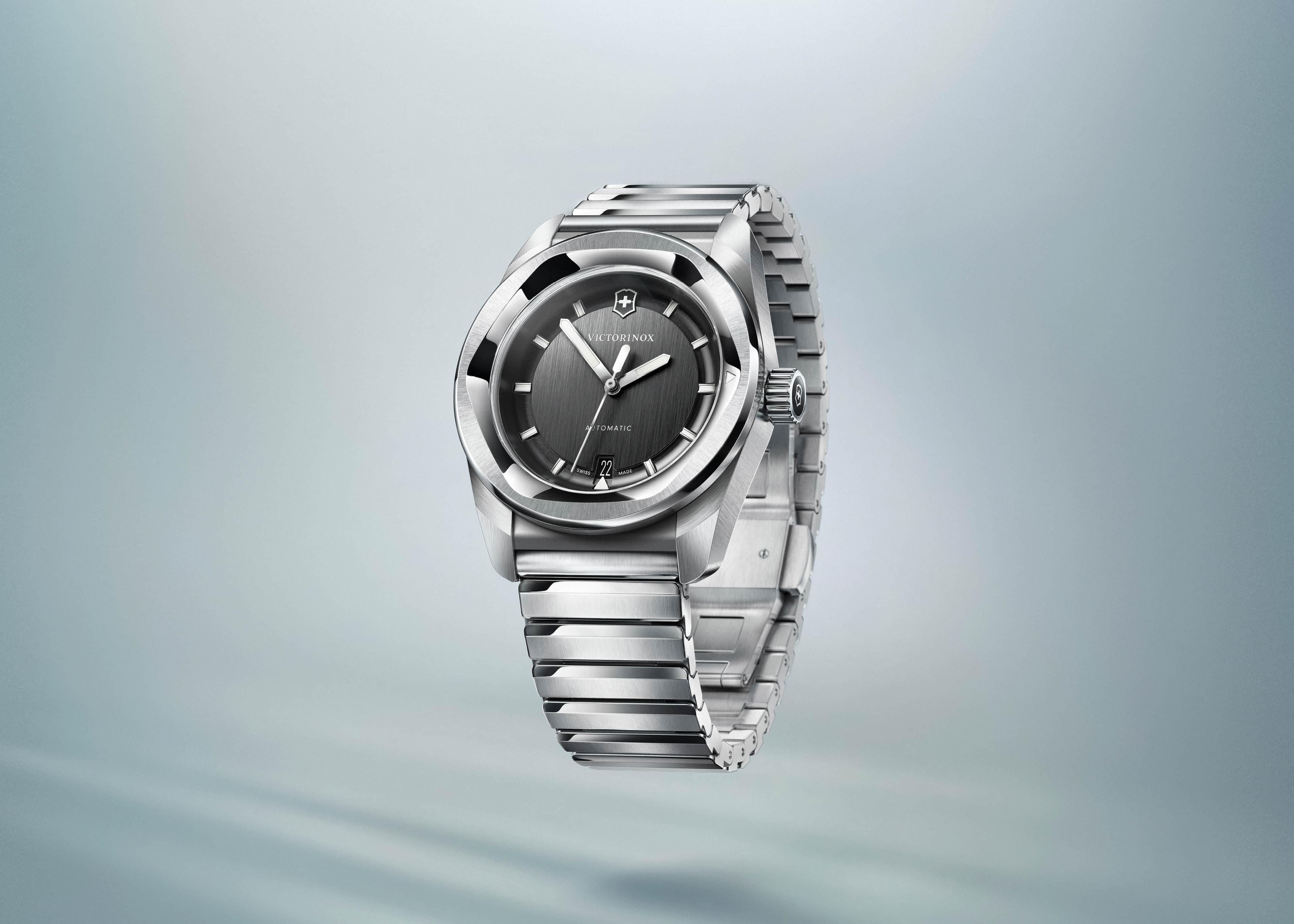 Steel automatic victorinox watch on steel bracelet with black dial